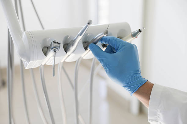 Professional Tooth Extraction technician working in St. Petersburg, FL